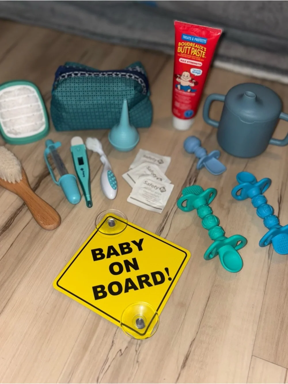 Baby Bundle including Baby On Board Car Window Sign, brushes, first aid travel